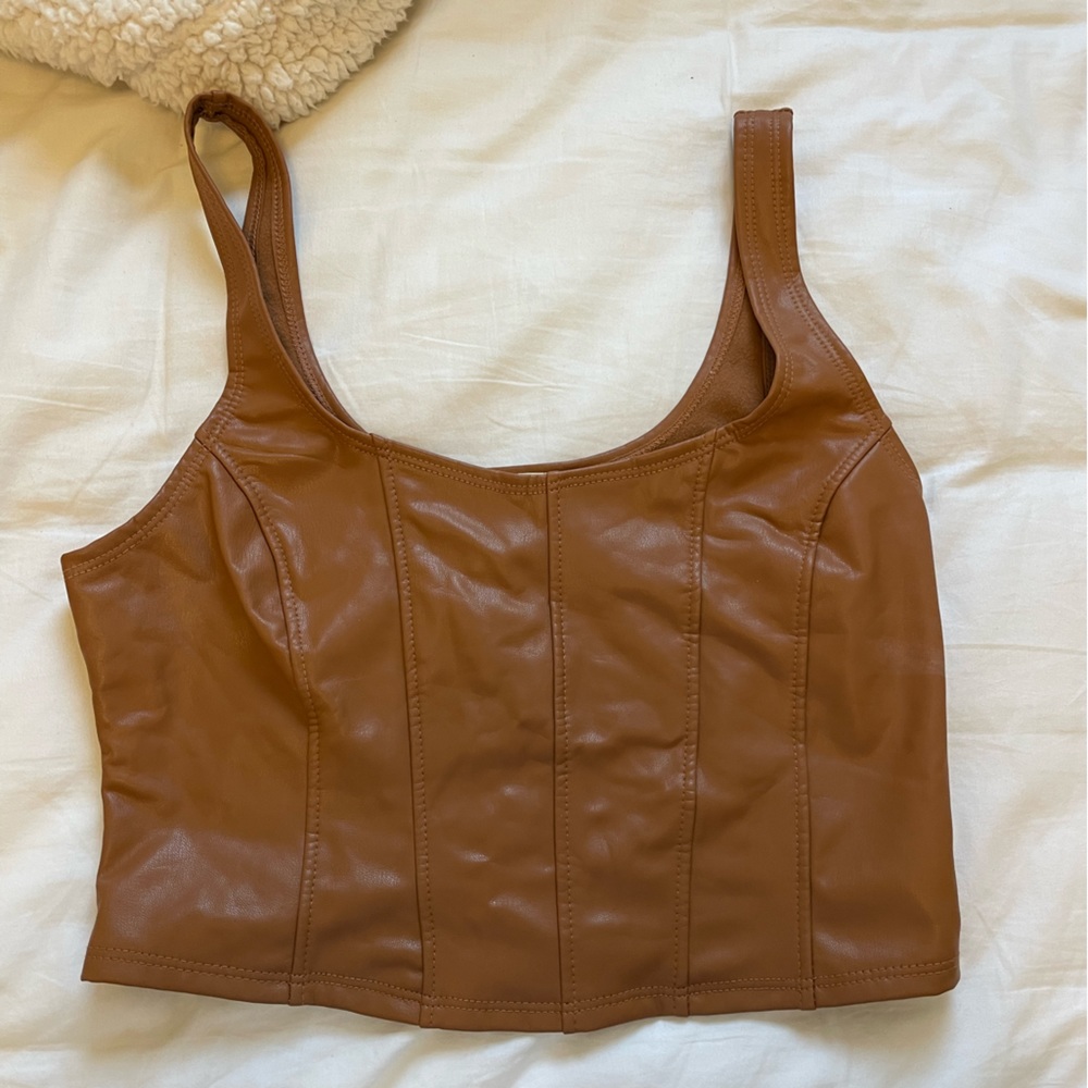 Light brown cropped leather tank.